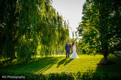 Indian bride and groom out in garden capture. Indian bride and groom out in garden capture.