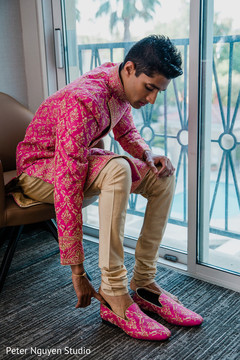 Rajah putting his wedding ceremony shoes. Rajah putting his wedding ceremony shoes.