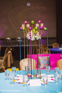 Colorful Sangeet table centerpiece decor. Colorful Sangeet table centerpiece decor.