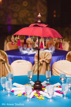 Sangeet umbrella table centerpiece decor. Sangeet umbrella table centerpiece decor.
