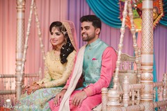 Graceful Indian bride and groom at sangeet. Graceful Indian bride and groom at sangeet.
