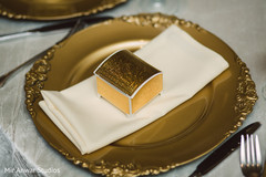 Magnificent Indian wedding golden favor capture. Magnificent Indian wedding golden favor capture.