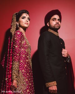 Elegant Indian couple posing for photo shoot. Elegant Indian couple posing for photo shoot.