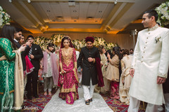 Indian couple walking out of ceremony. Indian couple walking out of ceremony.