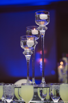 Elegant candle Indian wedding table decor. Elegant candle Indian wedding table decor.