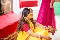 Indian bride smeared with yellow turmeric paste. Indian bride smeared with yellow turmeric paste.