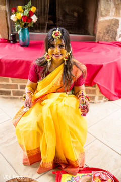 Lovely Indian bride's capture with turmeric paste. Lovely Indian bride's capture with turmeric paste.