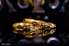 Marvelous Indian bridal golden bracelets with flowers decor. Marvelous Indian bridal golden bracelets with flowers decor.