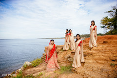 Sweet Indian bride and bridesmaids posing for photo shoot. Sweet Indian bride and bridesmaids posing for photo shoot.