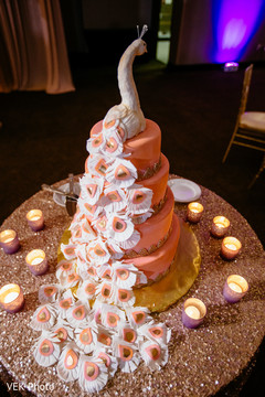 Incredible Indian wedding peacock cake topper. Incredible Indian wedding peacock cake topper.
