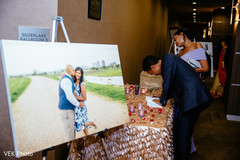 Great capture of Indian wedding guest signing book. Great capture of Indian wedding guest signing book.
