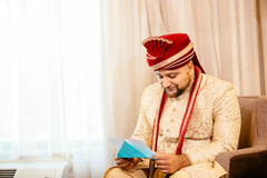 Indian groom reading maharanis letter. Indian groom reading maharanis letter.