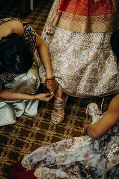 Maharani putting her shoes on. Maharani putting her shoes on.