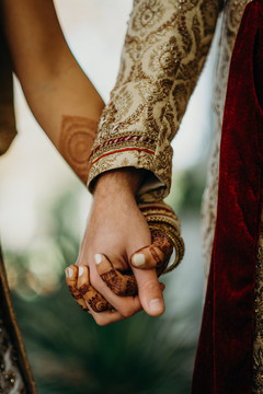 Closeup capture of indian couple holding hands. Closeup capture of indian couple holding hands.