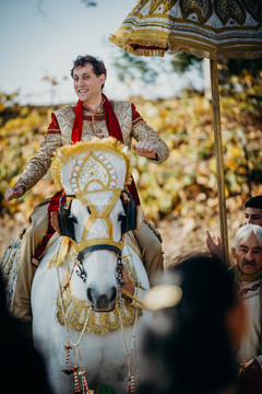 Indian groom on his baraat white horse. Indian groom on his baraat white horse.