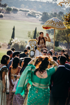 Fantastic view of the baraat procession . Fantastic view of the baraat procession .