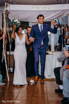 Indian bride and groom walking down the aisle. Indian bride and groom walking down the aisle.