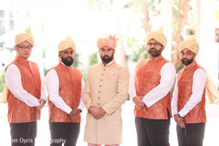 Indian groom posing with his groomsmen outdoors. Indian groom posing with his groomsmen outdoors.