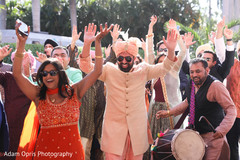 Elegant Indian groom dancing at baraat celebration. Elegant Indian groom dancing at baraat celebration.