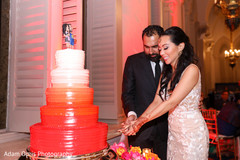 Lovely capture bride and groom cutting cake together. Lovely capture bride and groom cutting cake together.