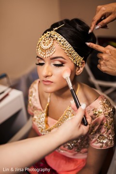 Gorgeous Maharani being assisted with makeup Gorgeous Maharani being assisted with makeup