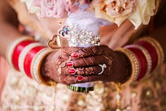 Indian bride holding the ornament Indian bride holding the ornament