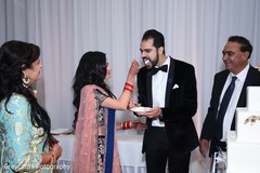 Bride and groom sharing a bite Bride and groom sharing a bite