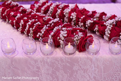 Closeup capture of Indian wedding red roses garlands. Closeup capture of Indian wedding red roses garlands.