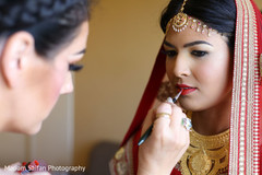 Last touch ups of Indian bridal makeup. Last touch ups of Indian bridal makeup.