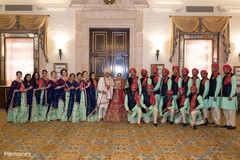 Indian couple posing with special guests Indian couple posing with special guests