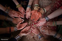 Bride and Maharanis showing their mehndi Bride and Maharanis showing their mehndi
