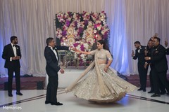 Indian bride and groom dancing at the reception Indian bride and groom dancing at the reception
