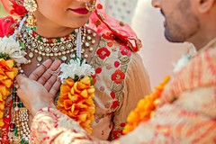 Indian groom holding the Mangamalai necklace. Indian groom holding the Mangamalai necklace.
