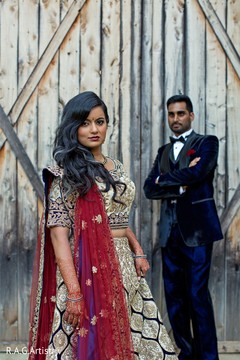 Elegant Indian bride and groom on their mehndi party outfits. Elegant Indian bride and groom on their mehndi party outfits.