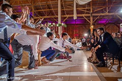 Cheerful Indian wedding reception dance. Cheerful Indian wedding reception dance.
