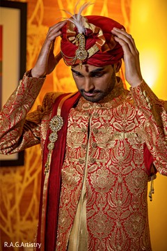 Indian groom putting his turban on. Indian groom putting his turban on.