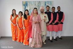 Elegant Indian couple with bridesmaids and groomsmen . Elegant Indian couple with bridesmaids and groomsmen .
