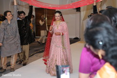 Stunning Indian bride making her entrance to ceremony. Stunning Indian bride making her entrance to ceremony.