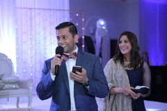 Indian wedding guests at reception speech. Indian wedding guests at reception speech.