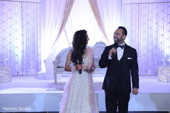 Indian bride and groom's reception speech moment. Indian bride and groom's reception speech moment.