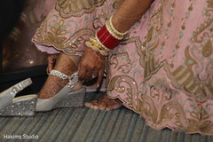Maharani putting her shoes on. Maharani putting her shoes on.