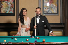 Charming indian couple at the reception game capture. Charming indian couple at the reception game capture.