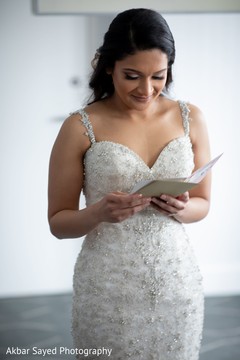 Indian bride reading the groom's letter Indian bride reading the groom's letter