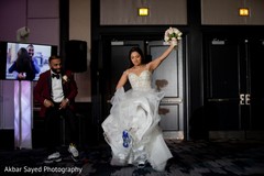 Indian bride and groom making their grand entrance Indian bride and groom making their grand entrance