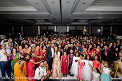 Amazing shot of the newlyweds with their guests Amazing shot of the newlyweds with their guests