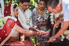 Indian couple during a ceremony ritual. Indian couple during a ceremony ritual.