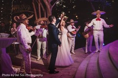 Indian couple having fun with the Mariachis. Indian couple having fun with the Mariachis.