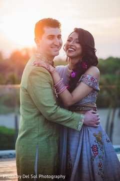 Lovely Indian bride and groom smiling. Lovely Indian bride and groom smiling.