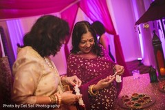 Indian guests choosing favors at sangeet. Indian guests choosing favors at sangeet.