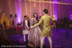 Indian couple dancing at sangeet. Indian couple dancing at sangeet.